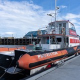 Safety boat at wharf