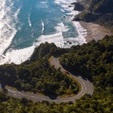 drone shot of coast road