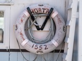 White old life ring on boat